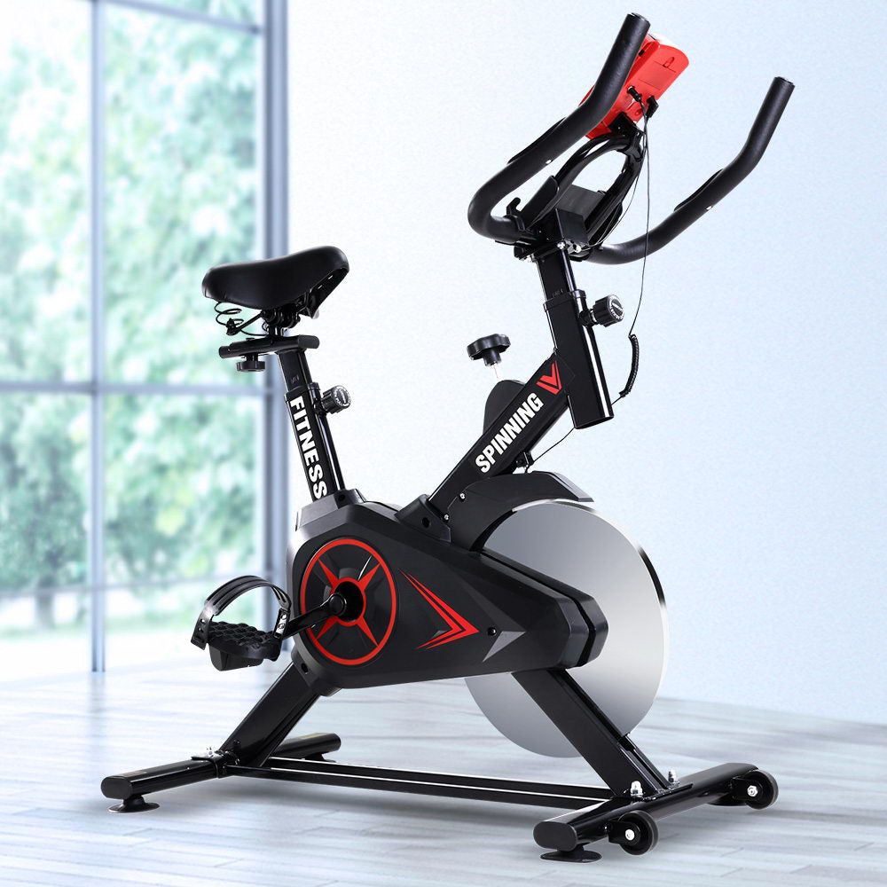 Black Everfit spin bike with adjustable seat and handlebars, flywheel, and digital display for home gym cycling workouts.