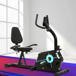 Black magnetic recumbent exercise bike by Online Fitness Depot, featuring a comfortable seat and digital display for indoor cardio workouts.