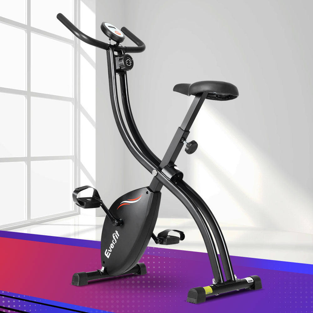 Black Everfit folding exercise bike with magnetic resistance, indoor cycling design and adjustable seat for cardio workouts.
