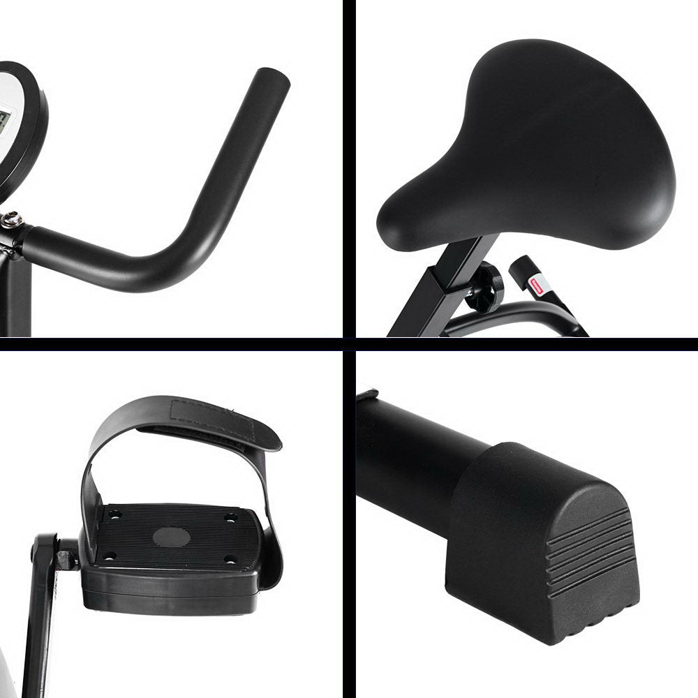 Black Everfit folding exercise bike with magnetic resistance, compact design, and adjustable seat for indoor cardio workouts.