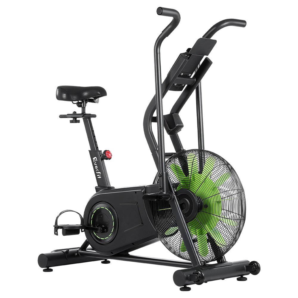 Black Everfit air bike with dual action handles and digital display for cardio workouts in a home gym setting.
