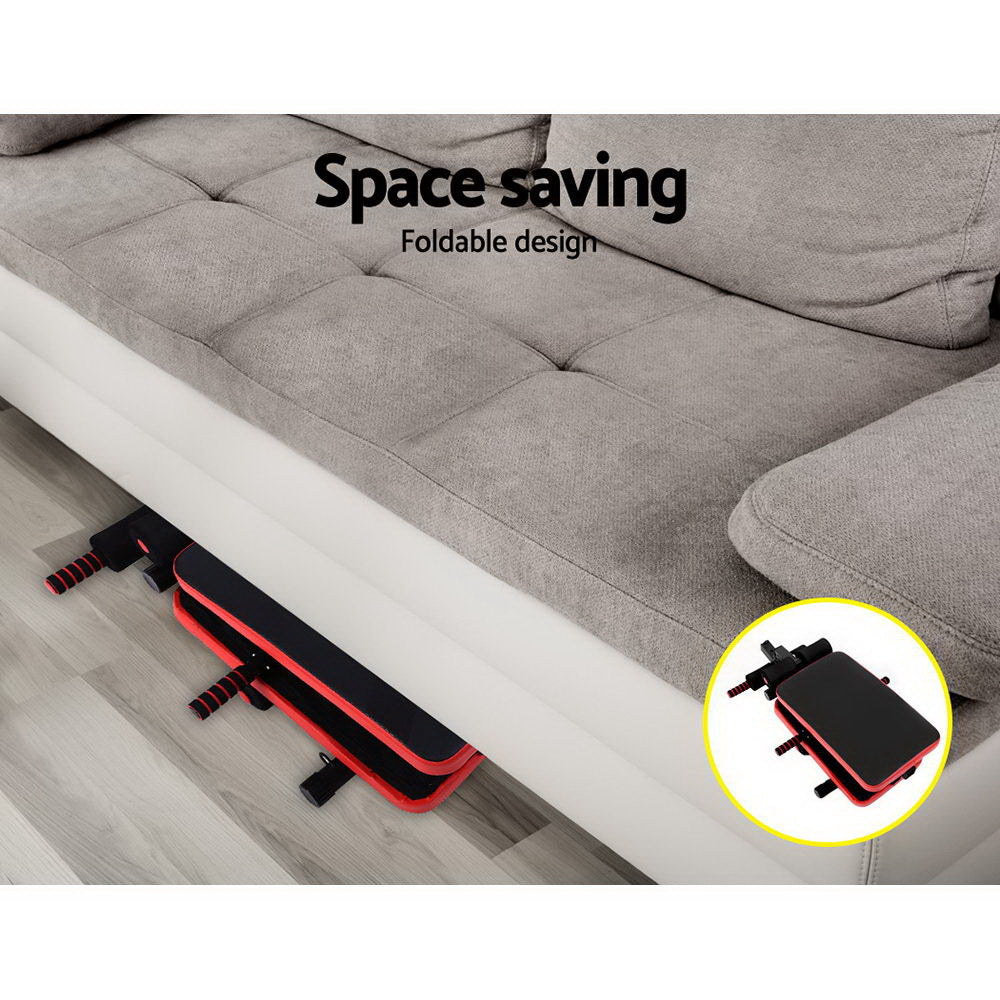 Foldable Everfit weight bench for sit-ups and presses, ideal for home gym workouts, with adjustable backrest and sturdy frame.