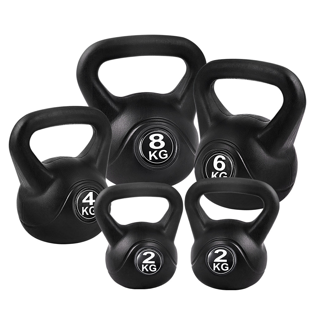 Set of five black kettlebells from Online Fitness Depot for strength training and fitness exercises.