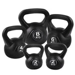 Set of five black kettlebells from Online Fitness Depot for strength training and fitness exercises.