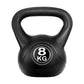 Set of 5 black kettlebells from Online Fitness Depot for strength training, arranged on gym floor with handles visible.