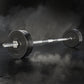 Everfit 48kg barbell set with weight plates and lifting bar on a gym bench, suitable for strength training and workout routines.
