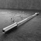Olympic-style Everfit barbell bar with weightlifting dumbbells and free weights for gym and fitness training.
