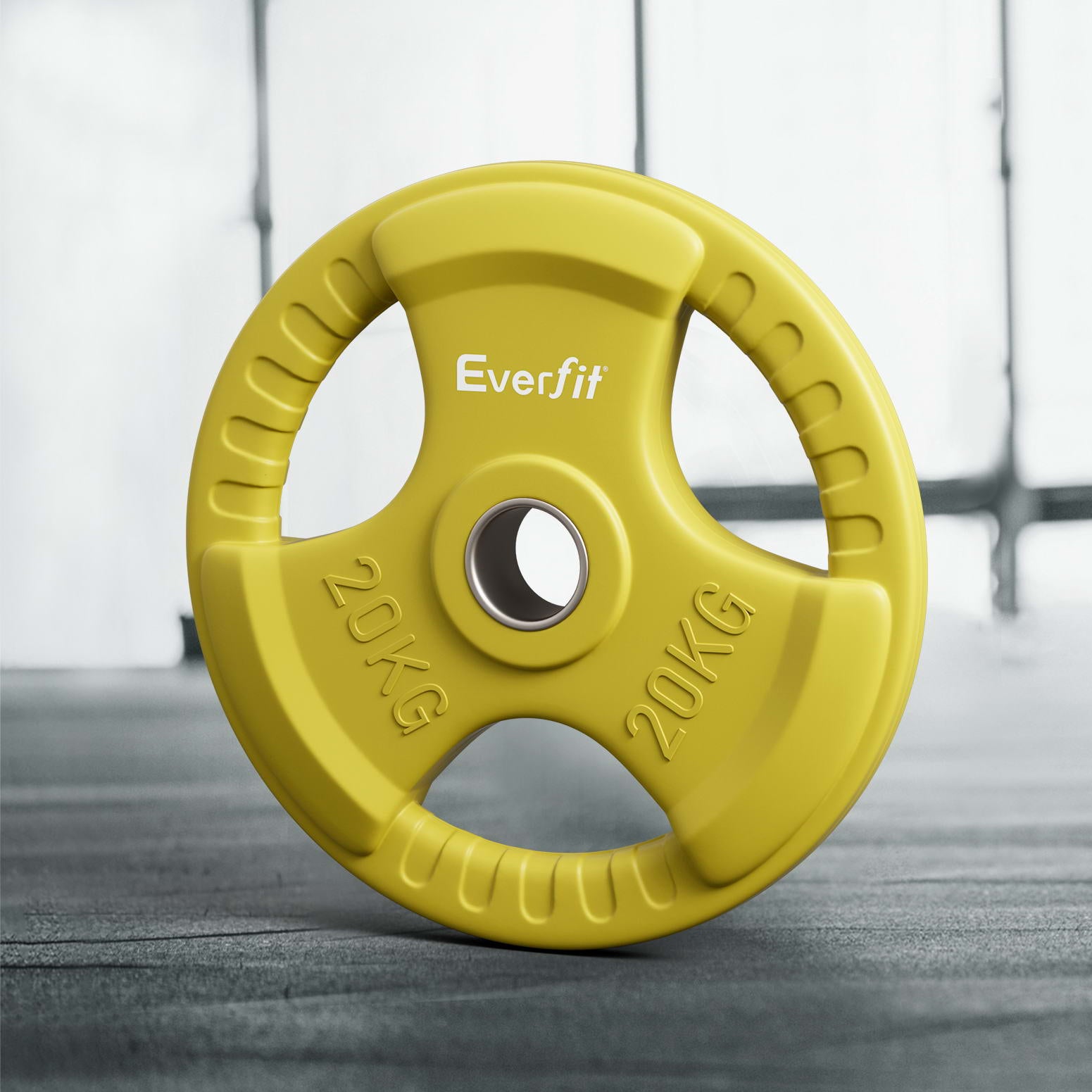 Yellow 20kg Olympic weight plates for dumbbell and barbell, designed for home gym weight lifting by Online Fitness Depot.