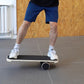 Wooden surf balance board for core training by Online Fitness Depot, showing the natural wood finish and curved design for stability.