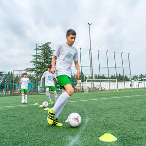 Online Fitness Depot football speed and agility training set with ladders, cones, and parachute for soccer training drills.
