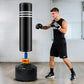 Black punching bag stand for adults and kids, 175cm height, ideal for boxing training and martial arts practice at home.
