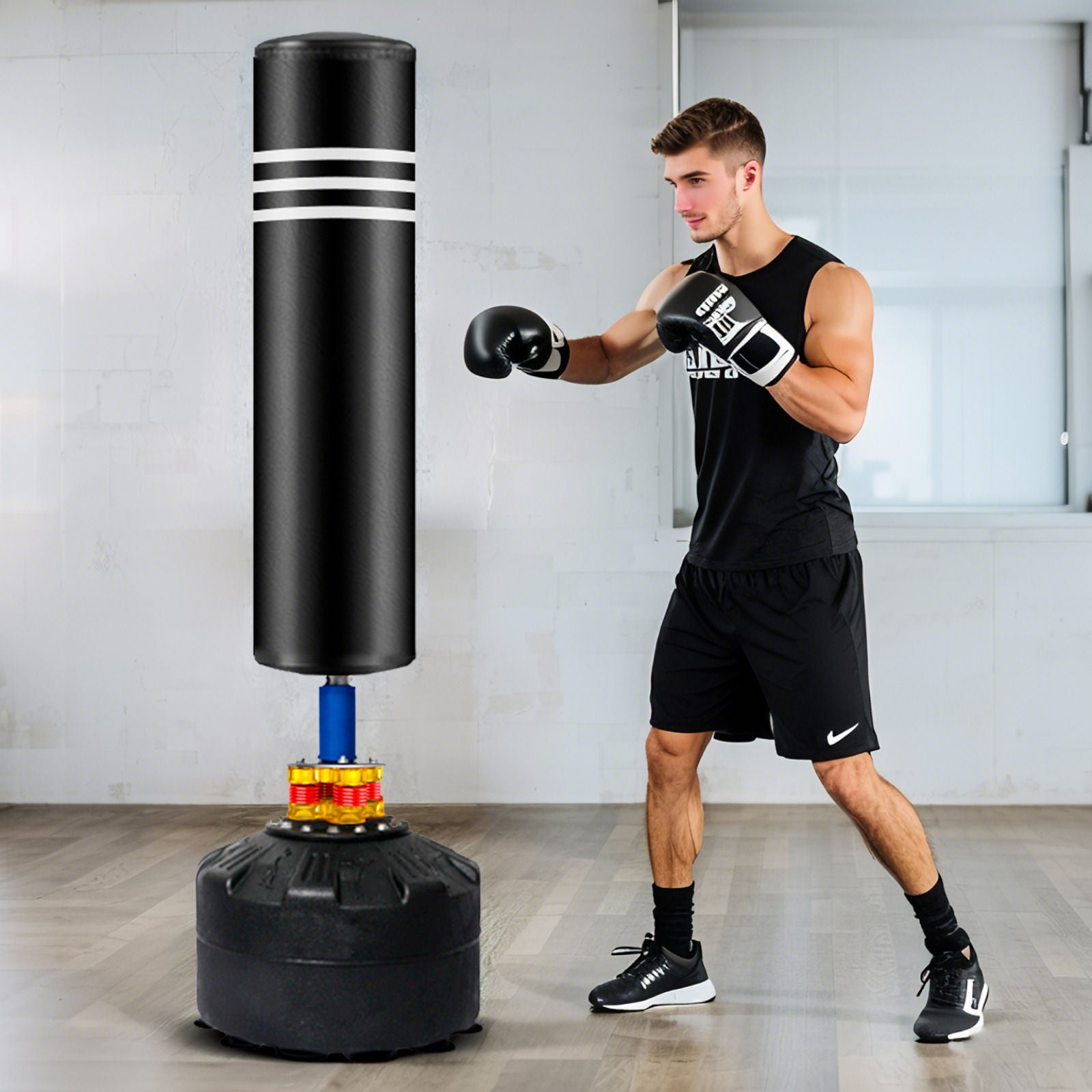 Black punching bag stand for adults and kids, 175cm height, ideal for boxing training and martial arts practice at home.