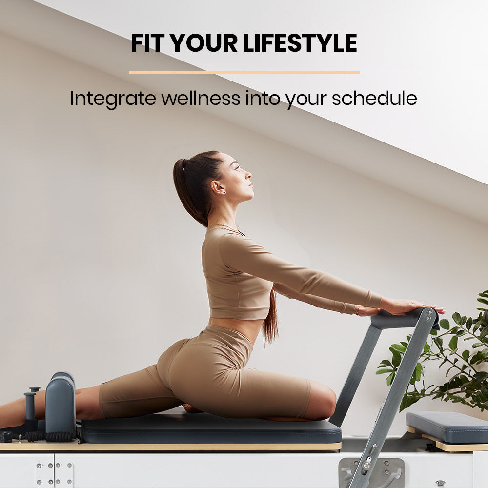 Aluminium Pilates Reformer Machine with stretch bed, jump board, and box accessories for yoga and fitness exercises.