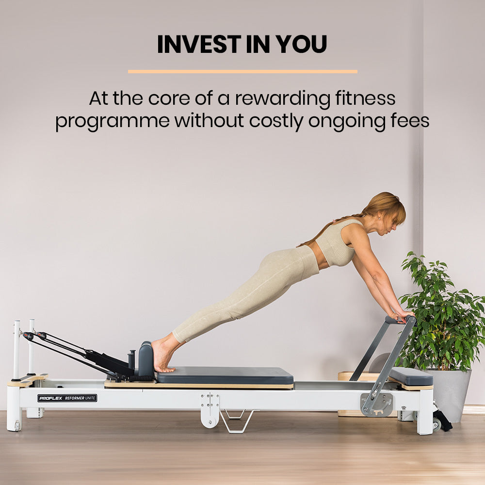 Aluminium Pilates Reformer Machine by Online Fitness Depot with stretch bed, box, and jump board accessories for yoga and fitness.