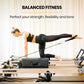 Wooden Pilates Reformer Machine with stretch bed, box, and jump board accessories for yoga and fitness workouts.