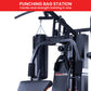 Powertrain Multi Station Home Gym with 150lb weights and punching bag for boxing and fitness training at Online Fitness Depot