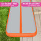Orange Powertrain Airtrack inflatable gymnastics tumbling mat, 3m x 1m x 20cm thick, for gymnastics and fitness training.