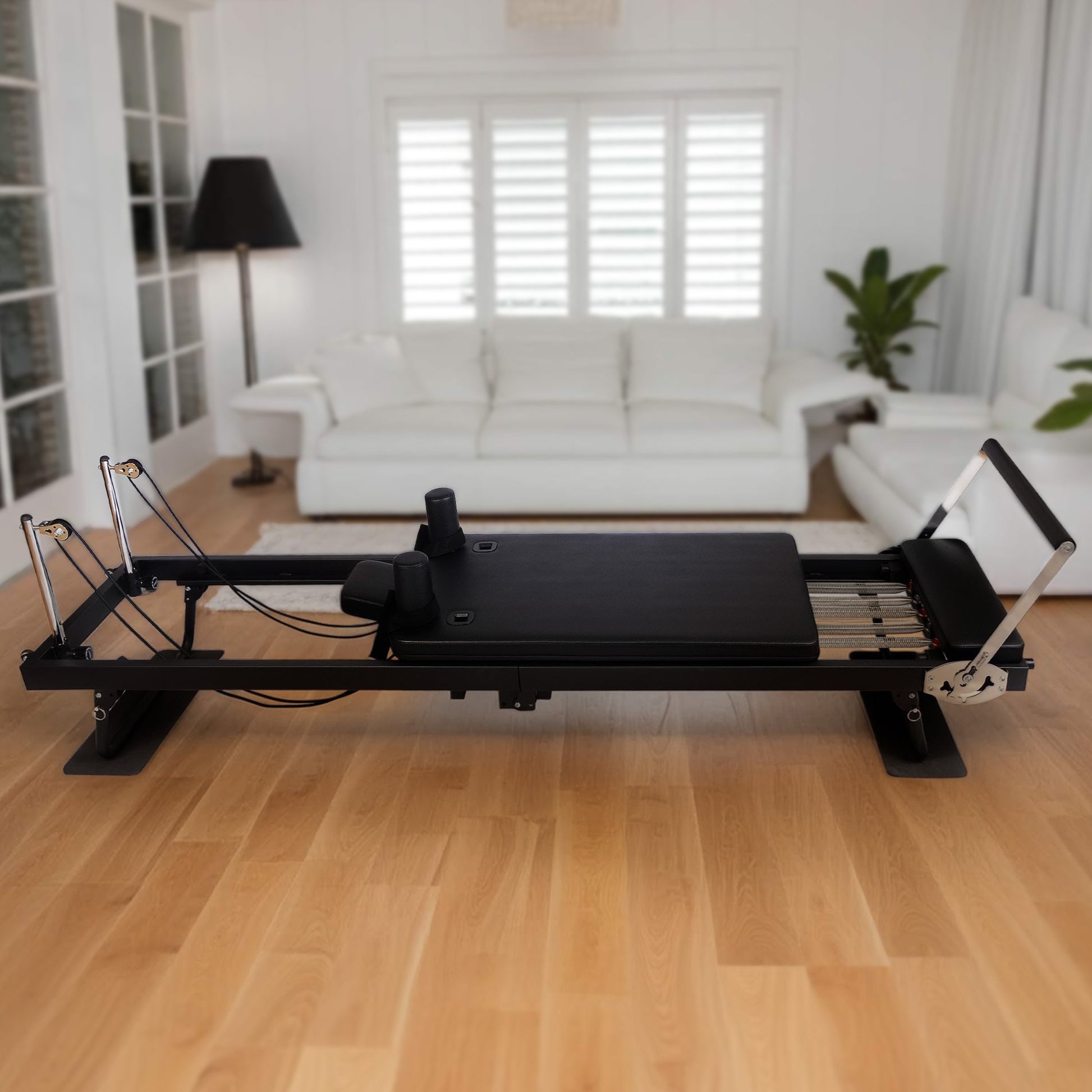 Powertrain Aria Steel Foldable Pilates Board Reformer with platform extender, ab trainer, sitting box, jumpboard, and footbar for full-body fitness.