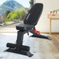 Adjustable Powertrain home gym dumbbell bench with padded seat and backrest for strength training exercises.