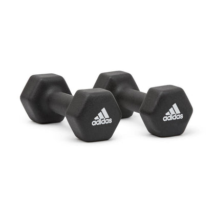 Pair of 3kg Adidas dumbbells for weight lifting and strength training, shown with black handles and metallic weights.
