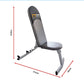 Adjustable FID flat incline decline bench press by Online Fitness Depot with padded seat and backrest for versatile strength training.