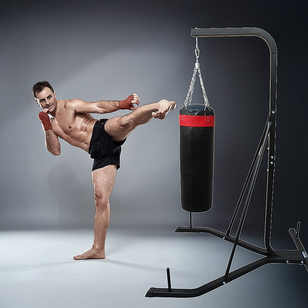 Freestanding 37kg heavy-duty punching bag for boxing and martial arts training, filled and ready for intense workouts.