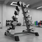 Steel vertical dumbbell rack from Online Fitness Depot with multiple slots for storing workout dumbbells in a gym setting.