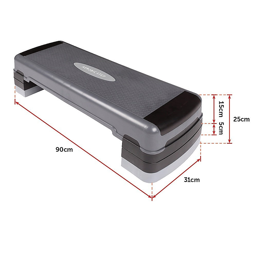 Adjustable aerobic step platform from Online Fitness Depot with non-slip surface for home gym cardio workouts.