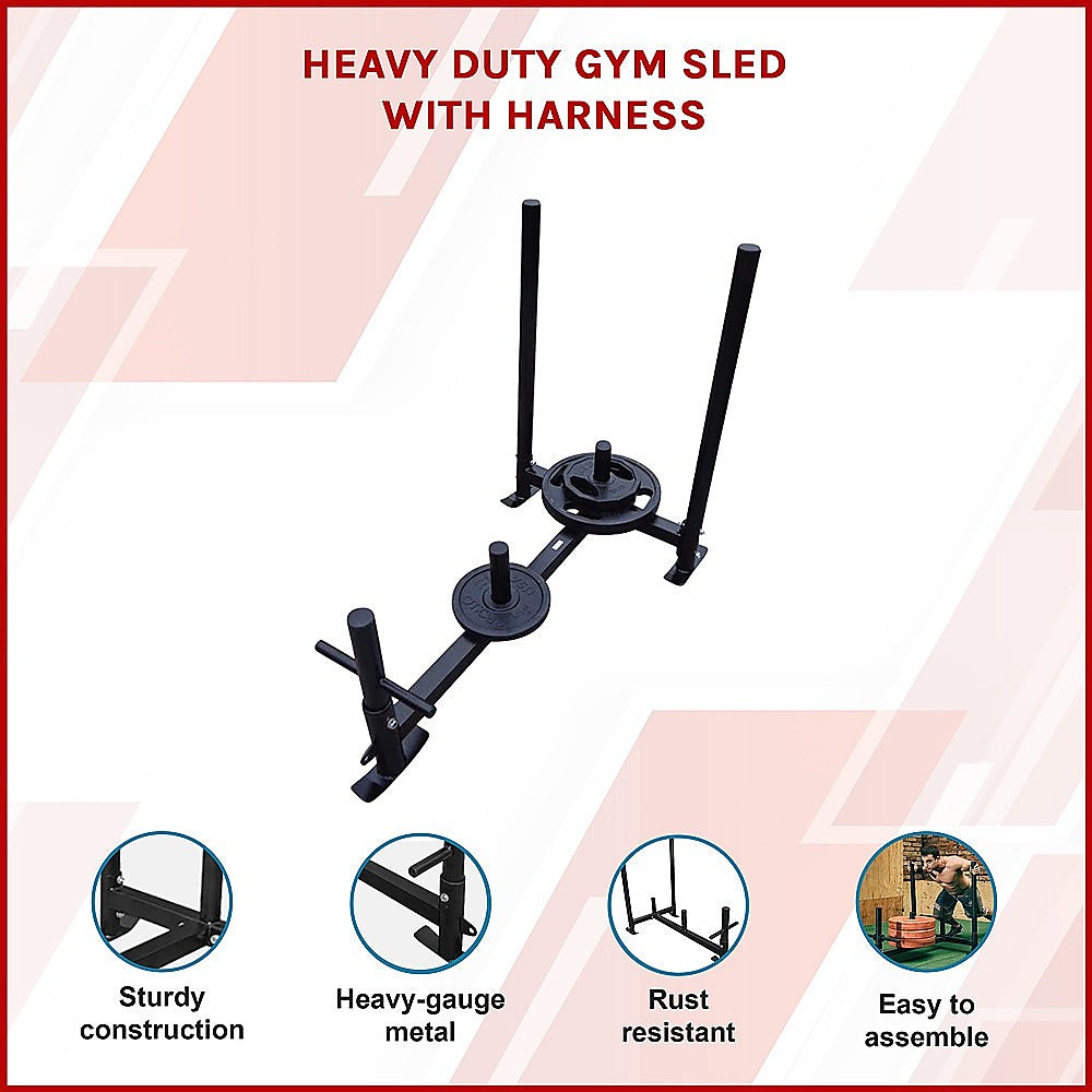 Heavy duty gym sled with harness for strength training, featuring durable metal frame and adjustable straps for versatile workouts.