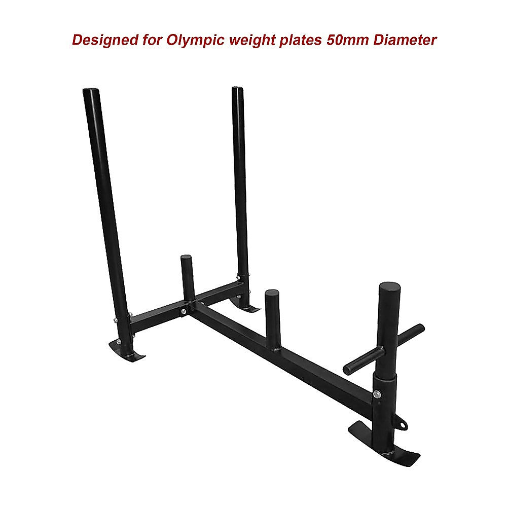 Heavy duty gym sled with harness for strength training, black metal frame and adjustable straps, designed for outdoor and gym use.