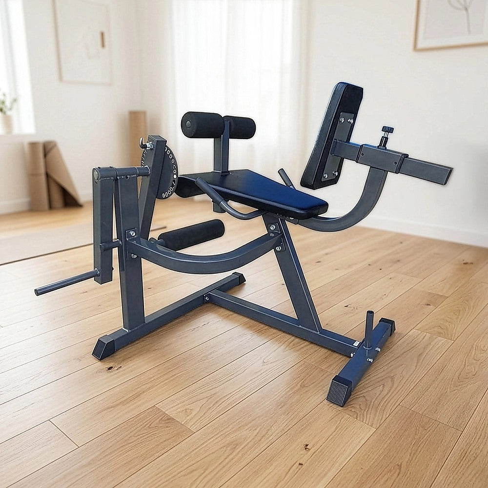 Adjustable leg extension curl machine from Online Fitness Depot for quad and hamstring workouts at home gym.