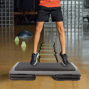 Online Fitness Depot aerobic workout 4-block bench step with sturdy plastic construction for exercise and fitness routines.