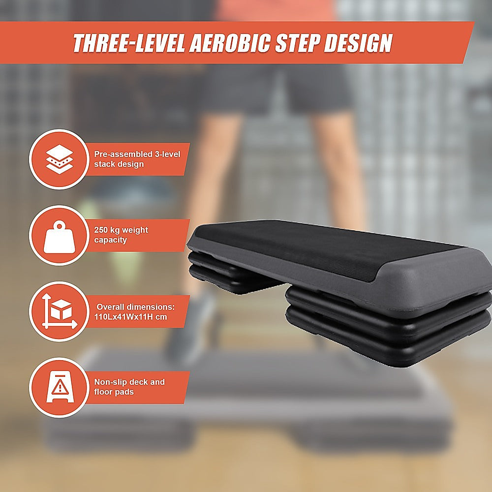 Online Fitness Depot aerobic workout 4-block bench step for exercise and gym training, with four sturdy plastic steps stacked together.