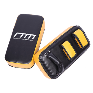 Thai pads kickboxing punching shield used for martial arts training, featuring a padded surface and adjustable straps for online fitness depot.