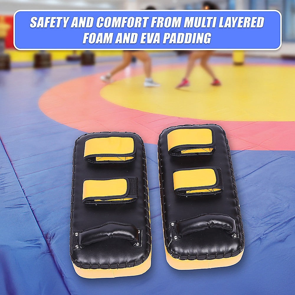 Thai pads kickboxing punching shield from Online Fitness Depot, showing padded surface and handle for martial arts training.