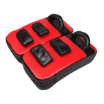 Pair of Thai boxing focus pad mitts from Online Fitness Depot for martial arts training and boxing strikes.