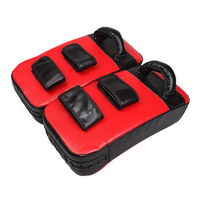 Pair of Thai boxing focus pad mitts from Online Fitness Depot for martial arts training and boxing strikes.
