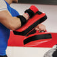 Pair of Thai boxing punch focus pad mitts for training and striking from Online Fitness Depot, designed for martial arts workouts.