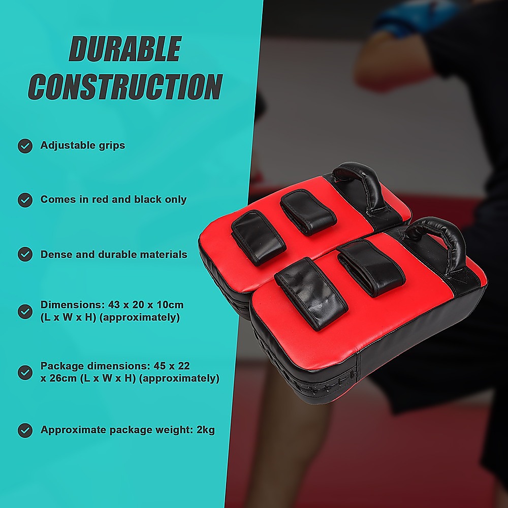 Pair of Thai boxing focus pad mitts for training and striking, designed for martial arts and boxing workouts.