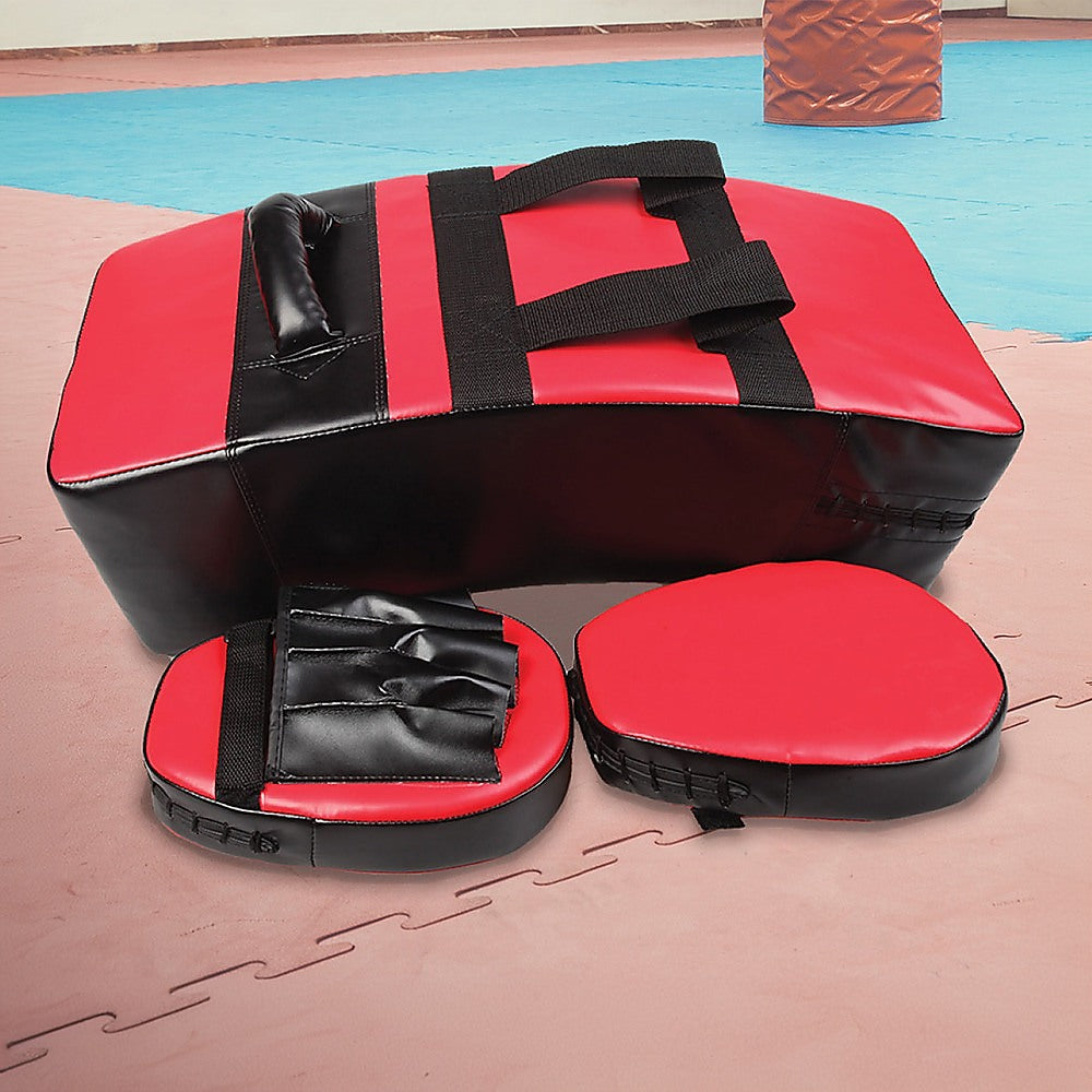 Kickboxing shield and punching pad set for sparring training, featuring black and red pads for boxing and martial arts workouts.