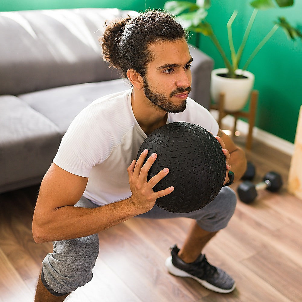 15kg Tyre Thread Slam Ball from Online Fitness Depot, used for gym fitness and weightlifting exercises.