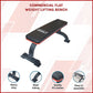 Commercial flat weight lifting bench from Online Fitness Depot, with padded surface and sturdy metal frame for gym workouts.