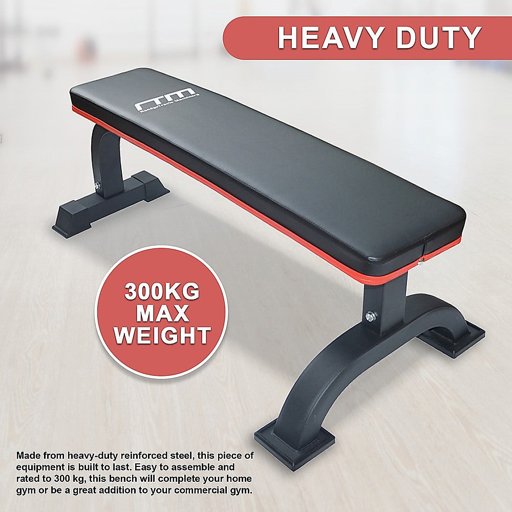 Commercial flat weight lifting bench from Online Fitness Depot with padded surface and sturdy metal frame for gym workouts.