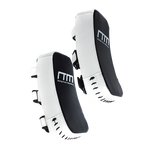Muay Thai kick boxing pad strike shield used for martial arts training, featuring padded surface and adjustable straps for boxing drills.