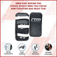 Muay Thai focus punching pad and strike shield for MMA kick boxing training, used in martial arts and boxing workouts.