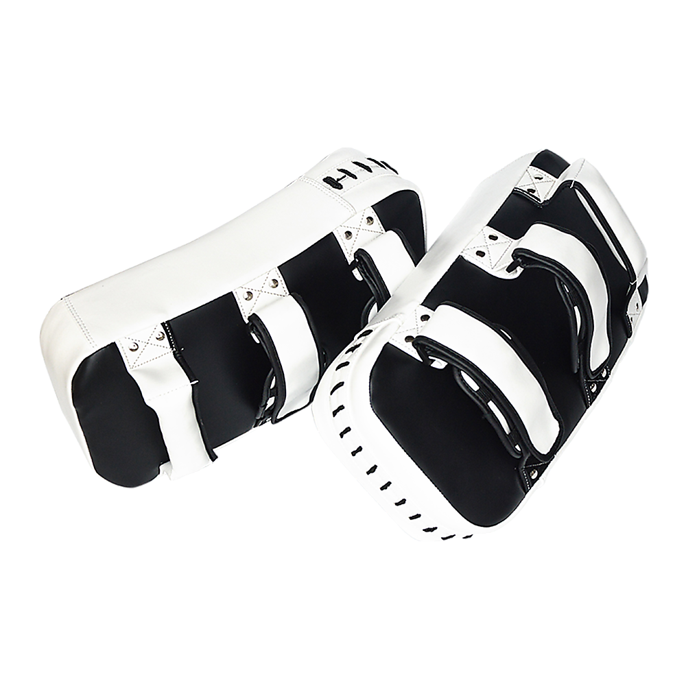 Muay Thai MMA kick boxing strike shield pad for punch training, featuring durable padding and adjustable straps for boxing and martial arts.