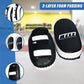 Curved MMA kick boxing pads and Muay Thai strike shield for boxing and martial arts training, used in fitness and gym workouts.