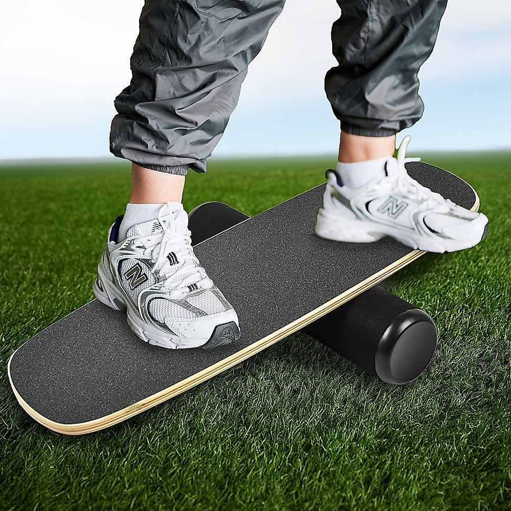 Balance board trainer with stopper and wobble roller for yoga, exercise, and fitness workouts by Online Fitness Depot.