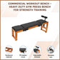 Heavy duty commercial workout bench from Online Fitness Depot with adjustable backrest for strength training exercises.
