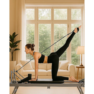 Foldable Pilates Reformer Machine by Online Fitness Depot, compact gym equipment for Pilates and exercise workouts.